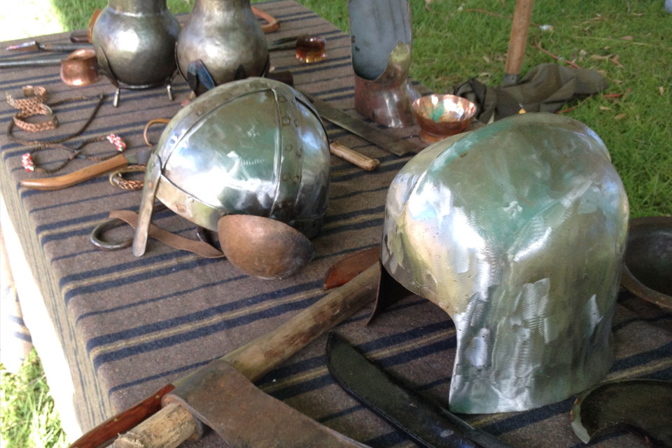 metal helms and tools on a table